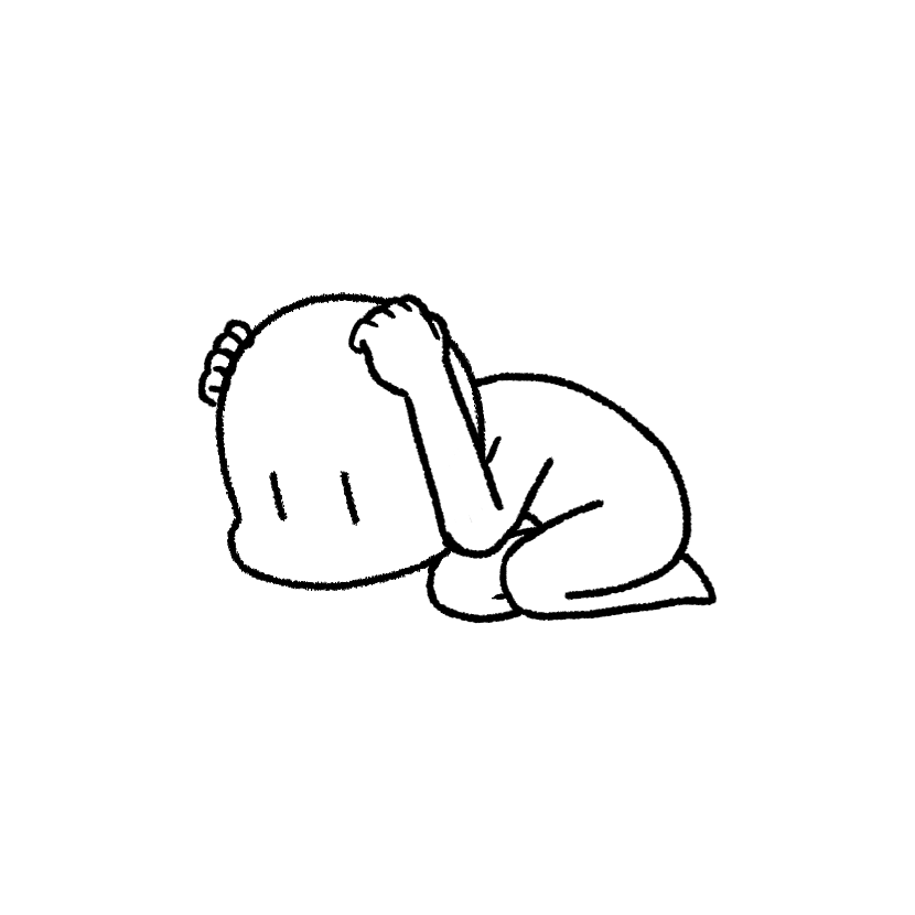 身をかがめて頭を守る