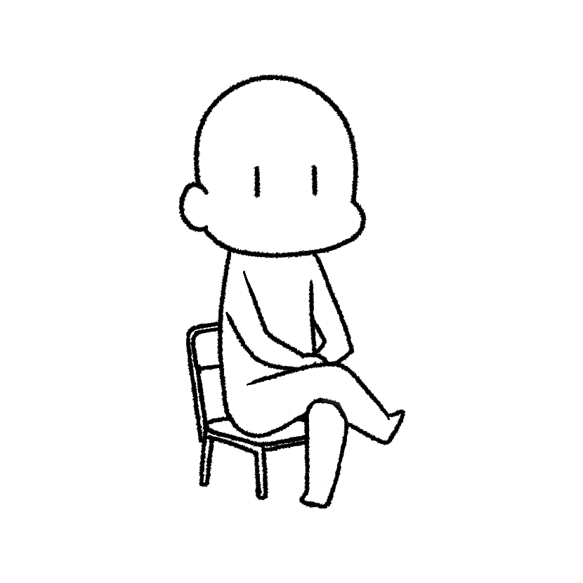 足を組んで座る