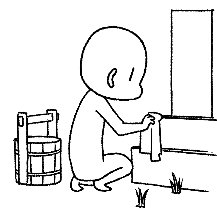 墓掃除をしている