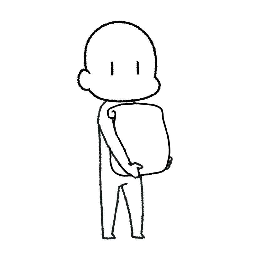紙袋を抱えて持つ